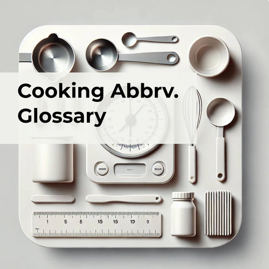 Cooking measuring tools laid on a white background